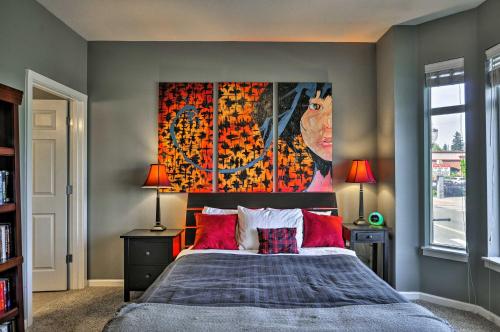 a bedroom with a large painting above a bed at Modern Vancouver Townhome - Right on Main St! in Vancouver