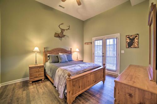 a bedroom with a large bed and a window at Family-Friendly Massanutten Home with Slope Views! in McGaheysville