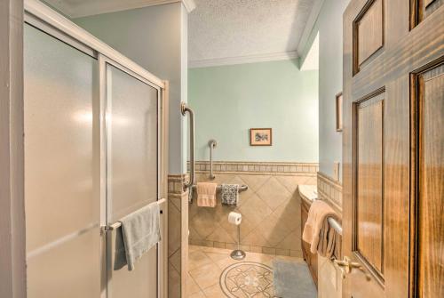 a bathroom with a shower and a glass door at Damascus Home with Fire Pit and Views, Walk to Shops! in Damascus