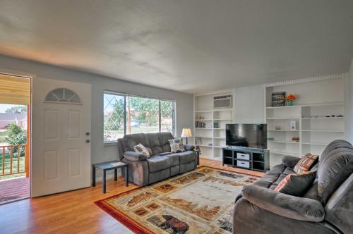 a living room with two couches and a television at Cottage Near Bryce Canyon and Zion National Parks! in Cannonville