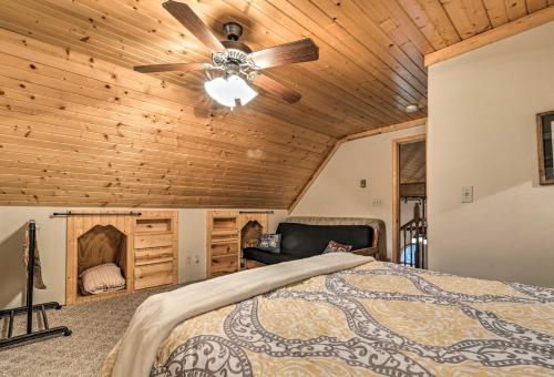 A bed or beds in a room at Rustic Cabin in the Woods 6 Mi to Snowshoe Resort
