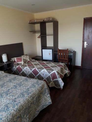 Cama o camas de una habitación en Hotel Dos Mares