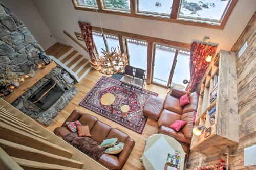 an overhead view of a living room with leather furniture at Architect-Designed Franconia Home Hot Tub and Views in Franconia