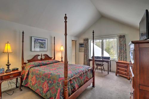 a bedroom with a bed and a table and a window at 4 Mi to Skiing Breckenridge Mountain Retreat! in Breckenridge
