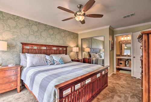 a bedroom with a bed and a ceiling fan at Port Aransas Condo with Pool Access Walk to Beach! in Mustang Beach