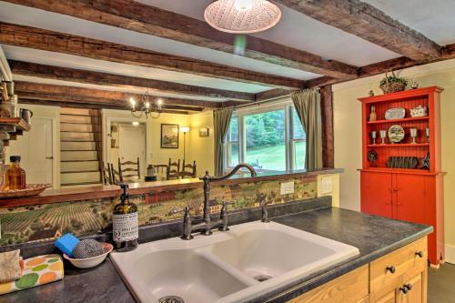 a kitchen with a large sink and a window at Historic Hanover Area Home, 16 Miles to Dartmouth! in Enfield