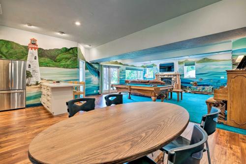 a dining room with a table and a lighthouse mural at Under the Sea and Ski Apt with View, Near Dwtn in Salt Lake City