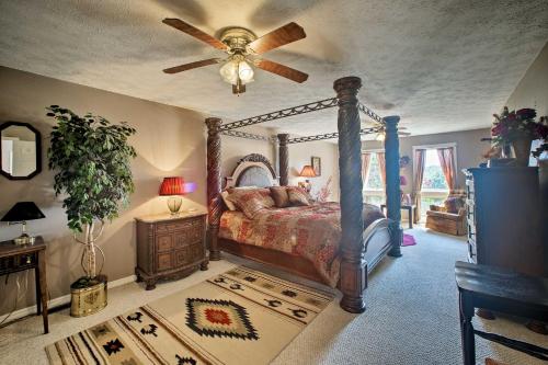 a bedroom with a bed and a ceiling fan at Pet-Friendly, Lakefront Home in Golden with Patio! in Golden