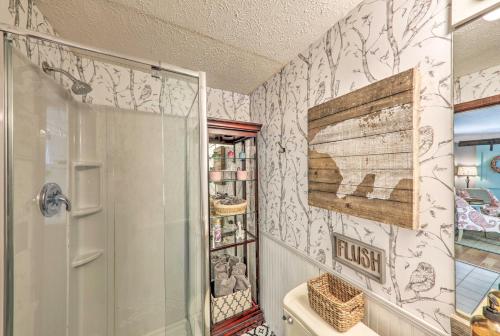a bathroom with a shower and a toilet at Getaway on Center Hill Lake with Decks and Water Views in Silver Point