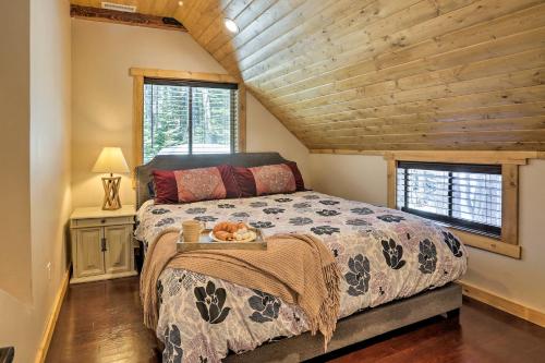 a bedroom with a large bed with a wooden ceiling at Truckee Family Home, Walk to Lake and 5 Mi to Skiing in Truckee