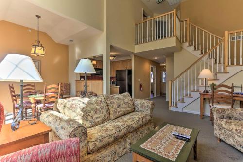 a living room with a couch and a table at Mountain Creek Resort Home - Hot Tub and Pool Access in Vernon Township