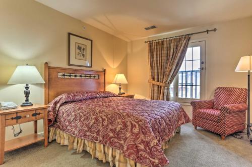 um quarto com uma cama, uma cadeira e uma janela em Mountain Creek Resort Home - Hot Tub and Pool Access em Vernon Township