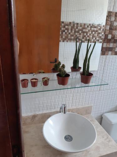 Et badeværelse på Casa de Temporada Illôa