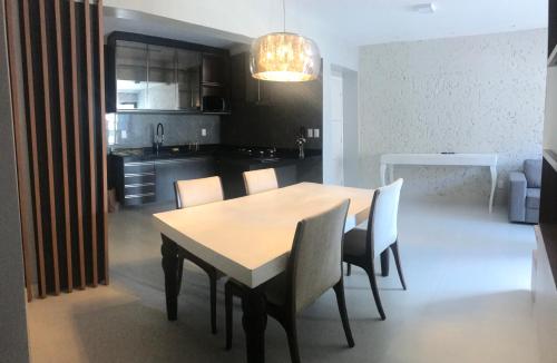 مطبخ أو مطبخ صغير في Apartamento Confortável Beira-Mar