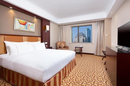 TV o dispositivi per l'intrattenimento presso Jianguo Hotel Shanghai