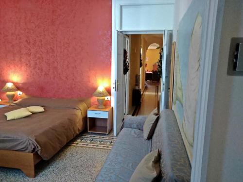 Una cama o camas en una habitación de B&B Vico Vacanze