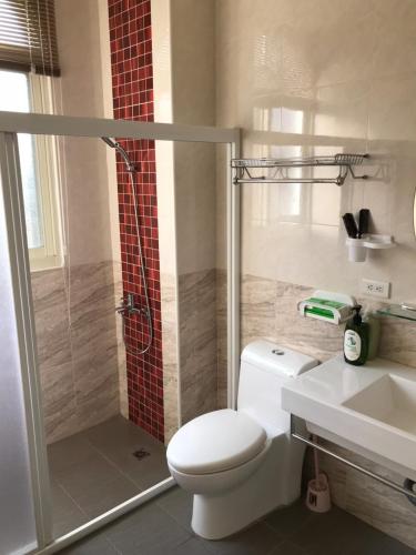 Koupelna v ubytování 山同青旅Backpacker Hostel