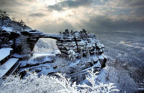 a view of a mountain covered in snow at Apartmán Třebenice - vstupní brána do Českého středohoří in Třebenice