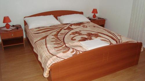 Postel nebo postele na pokoji v ubytování Apartments Kuss