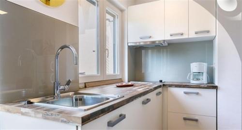 Kuchyň nebo kuchyňský kout v ubytování Apartment Fig Tree