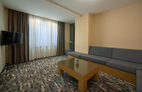 TV a/nebo společenská místnost v ubytování Tan Hotel - Special Category