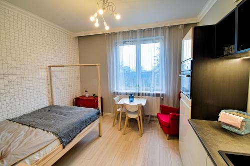City Life Apartments Kraków tesisinde bir odada yatak veya yataklar