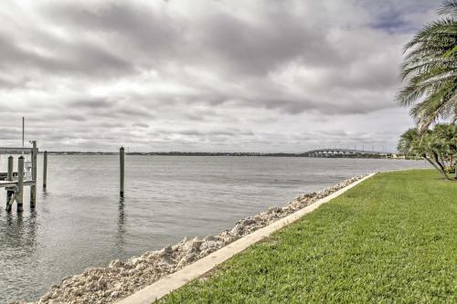 a view of a body of water with a dock at Sand Dollar Jenson Beach Home with Pool Access! in Jensen Beach