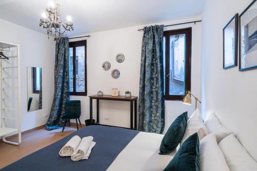 Postel nebo postele na pokoji v ubytování Haus Ormesini