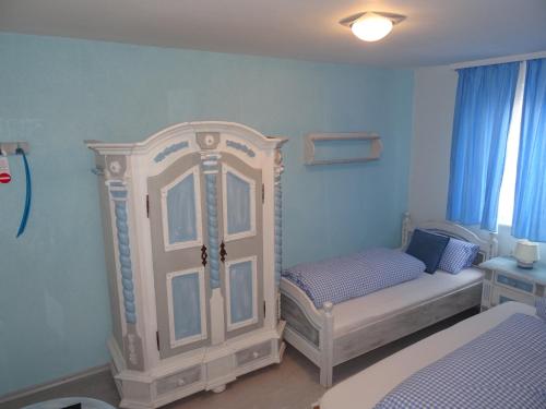 Ένα ή περισσότερα κρεβάτια σε δωμάτιο στο Hotel 4 Jahreszeiten mit Restaurant