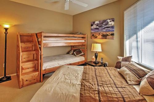 a bedroom with two bunk beds and a window at Condo with Pool Access Less Than 4 Mi to Bellair Golf Club! in Phoenix