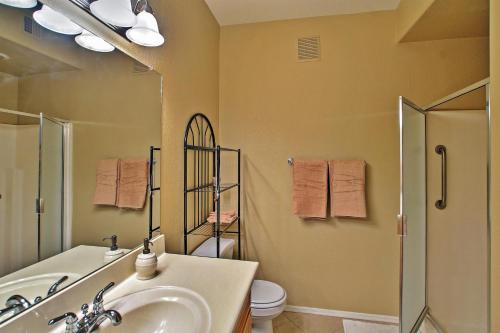 a bathroom with a sink and a shower and a toilet at Phoenix Abode Pool Access, Near Bellair Golf Club in Phoenix