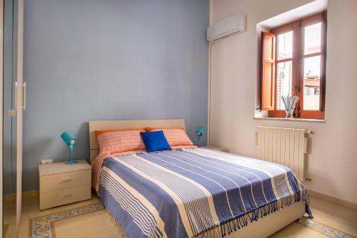 Voodi või voodid majutusasutuse La Casa di Sara a Mondello toas
