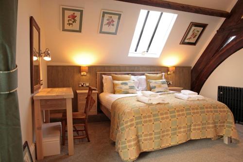 Ένα ή περισσότερα κρεβάτια σε δωμάτιο στο Y Capel Guest House