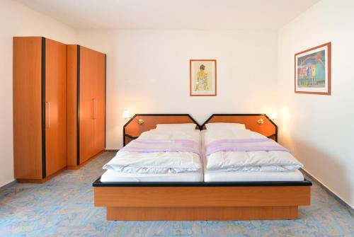 Ένα ή περισσότερα κρεβάτια σε δωμάτιο στο Rhön-Hotel Sonnenhof - Restaurant & Café