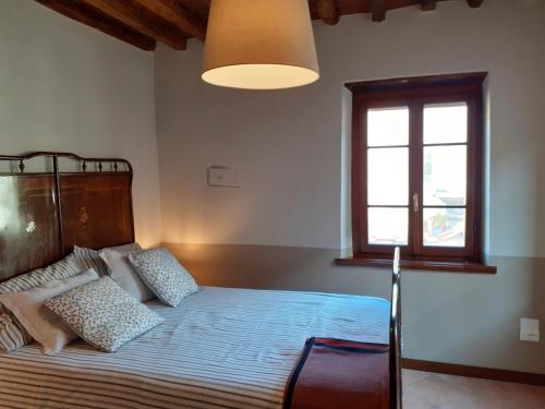Postel nebo postele na pokoji v ubytování Casa Nostra Camaiore