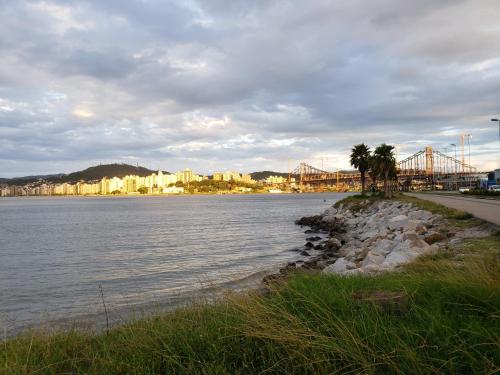 a view of a body of water with a bridge at Hostel Nossa Casa in Florianópolis