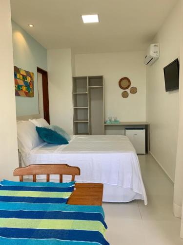 Postel nebo postele na pokoji v ubytování Pousada Ipioca Beach Village