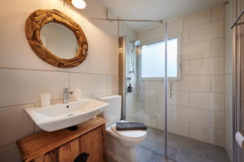 Um banheiro em Stay Switzerland Apartments