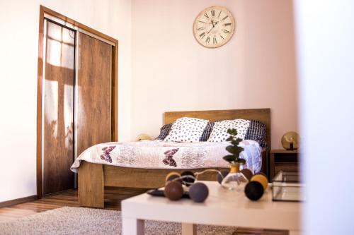 Łóżko lub łóżka w pokoju w obiekcie Voal Apartamenty