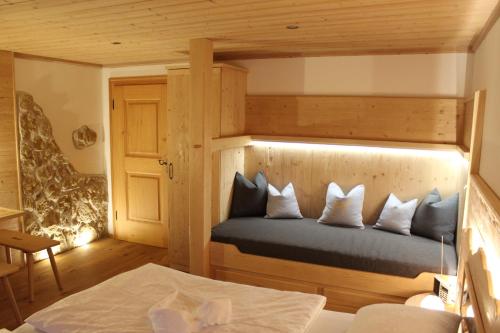 Tempat tidur dalam kamar di Pension Gerstenbrand