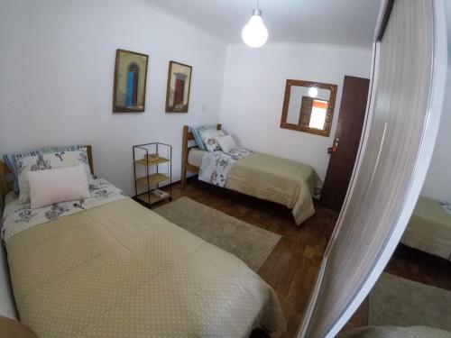 Postel nebo postele na pokoji v ubytování Corona Hostel