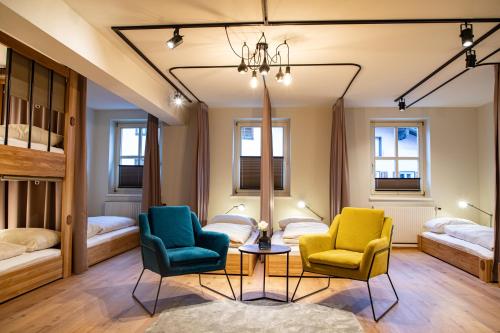 Posezení v ubytování Roomie Alps Design Hostel