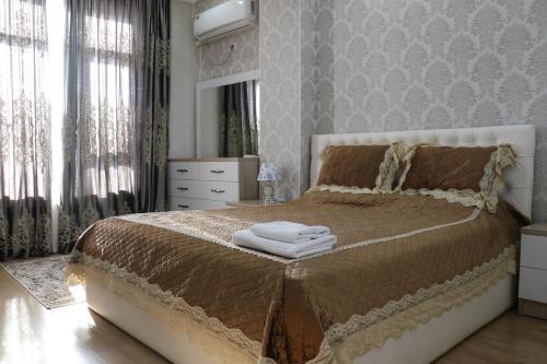 Giường trong phòng chung tại Hotel Apartment Al-Salam