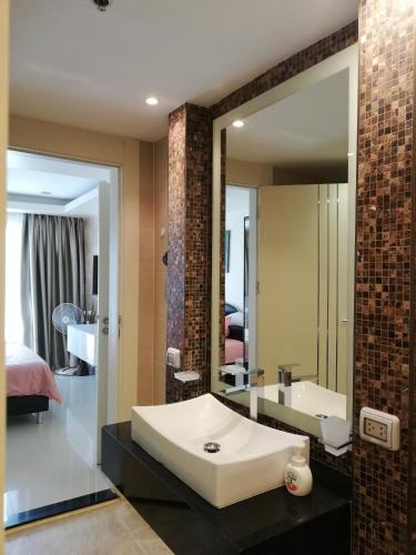 Bilik mandi di Cosy Beach View Apartments