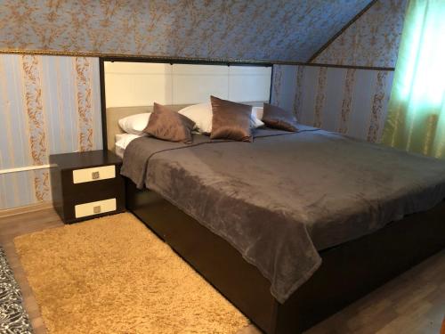 Кровать или кровати в номере Мини Отель Сак