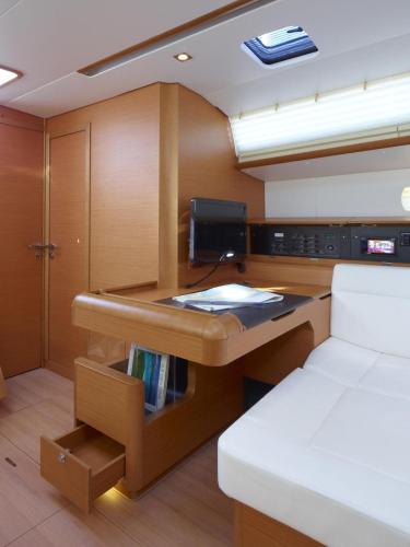 a living room with a desk in a boat at BARCA Alto Livello in Lido di Ostia