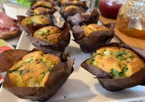 a bunch of muffins sitting on a plate at Hotel Storyville - svago e convenzioni aziendali in Cinquale