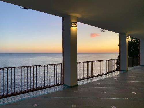 a view of the ocean from a balcony at Villa Le Baste in Furore