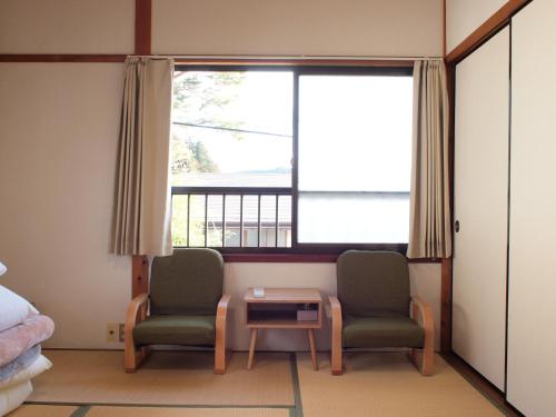 Χώρος καθιστικού στο Guest House hachi hachi