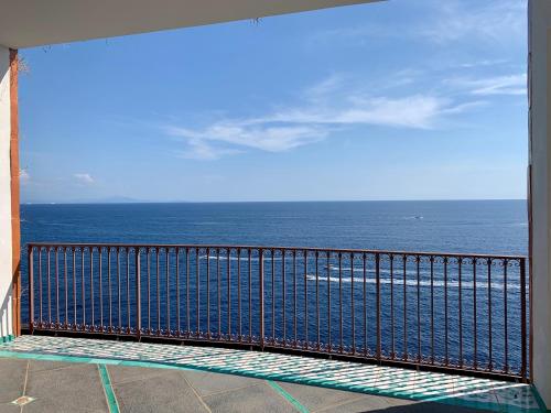 a view of the ocean from a balcony at Villa Le Baste in Furore